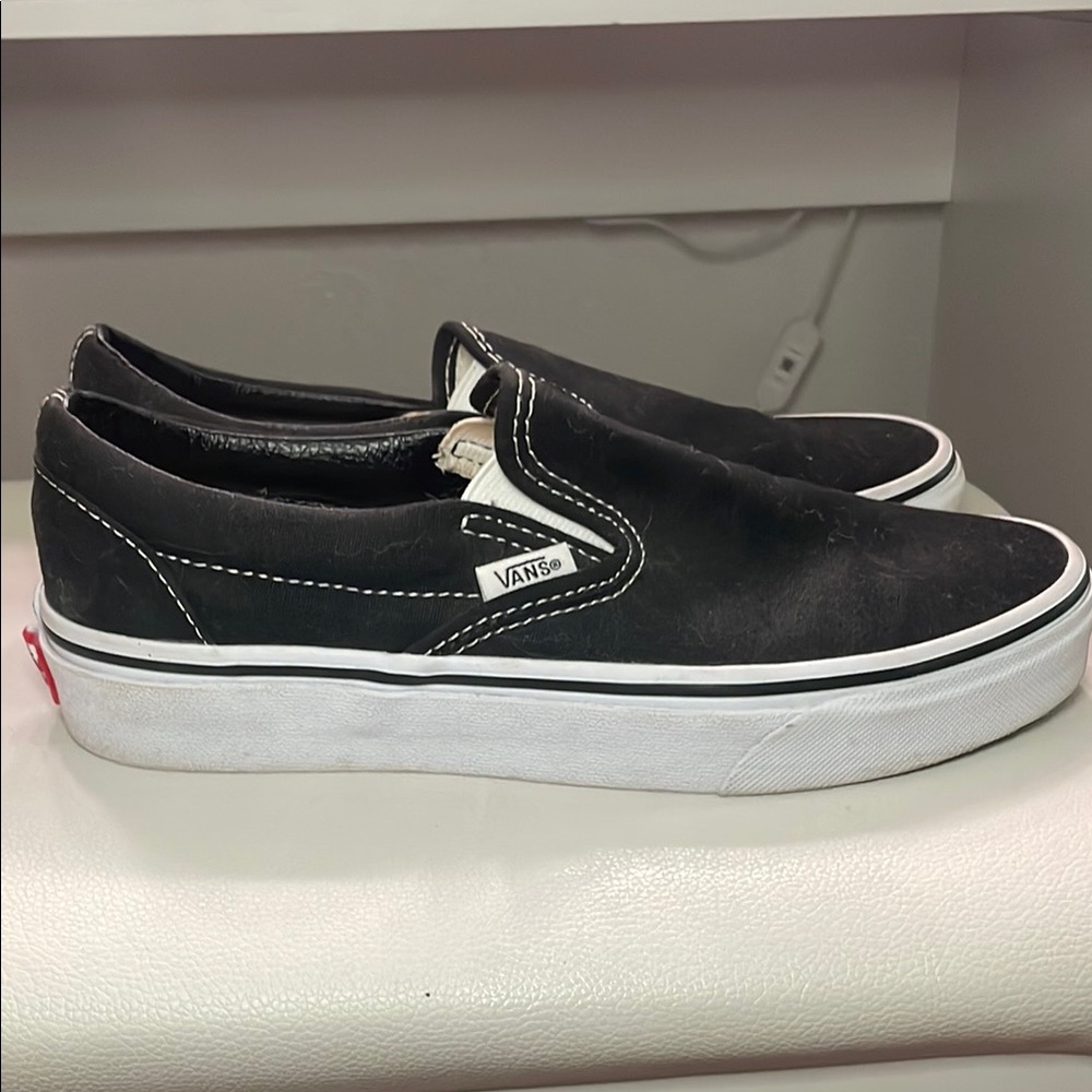 Vans Black and White Slip-On Sneakers with Canvas Upper